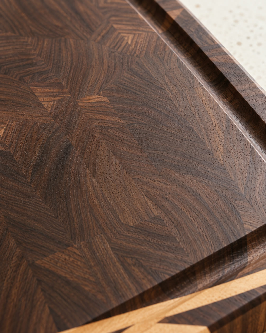 Close-up of the walnut end grain pattern on the board's surface